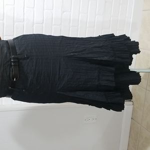 Black dusky midi fitted skirt,  ruffled on bottom. Bought in Turkey.